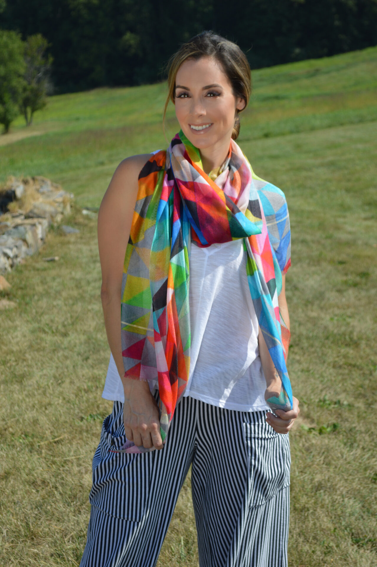 A woman wearing a colorful Dupatta scarf