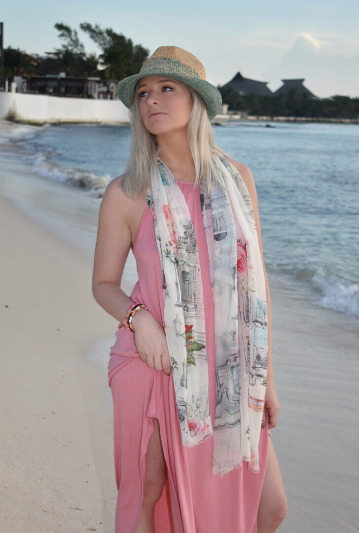 A girl at the beach wearing a Dupatta scarf