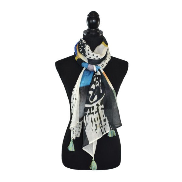 Abstract print scarf on mannequin.