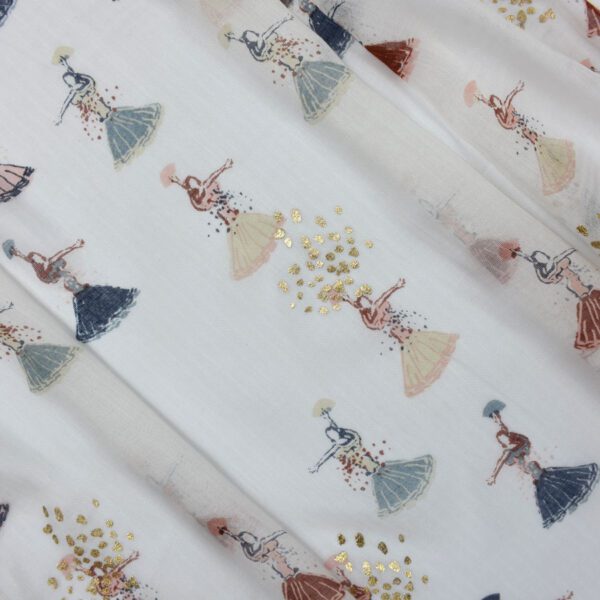 White fabric with dancing girls print.