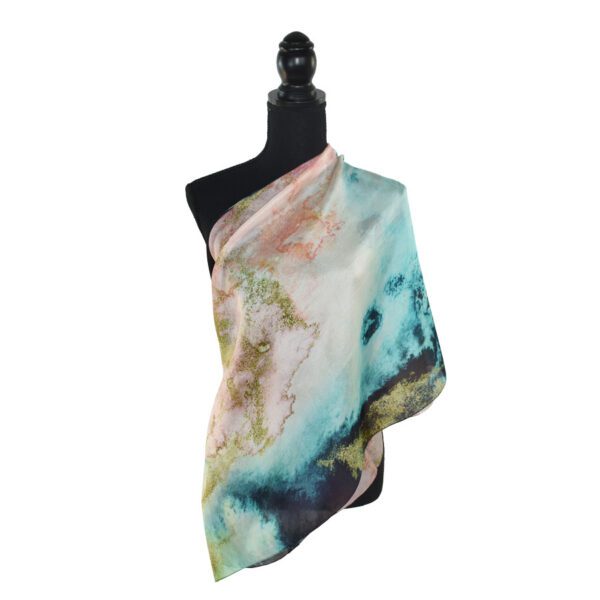 Abstract art silk scarf on mannequin.