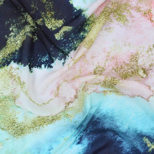 Abstract teal, pink, and gold fabric.