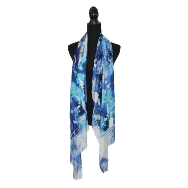 Blue floral patterned scarf on mannequin.