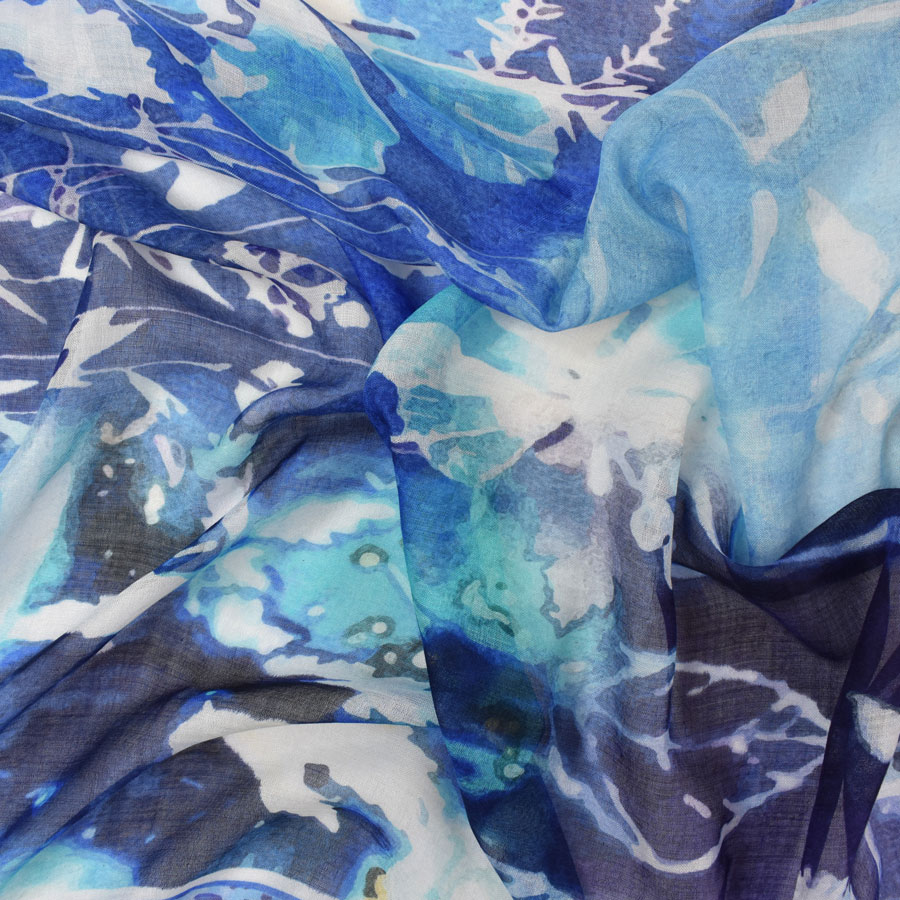 Blue watercolor print fabric swatch.