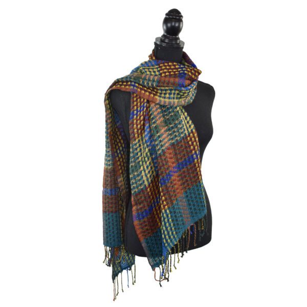 Colorful plaid scarf on mannequin.