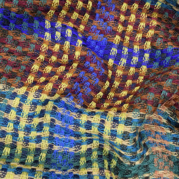 Colorful woven textile with plaid pattern.