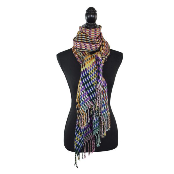 Colorful plaid fringed scarf on mannequin.