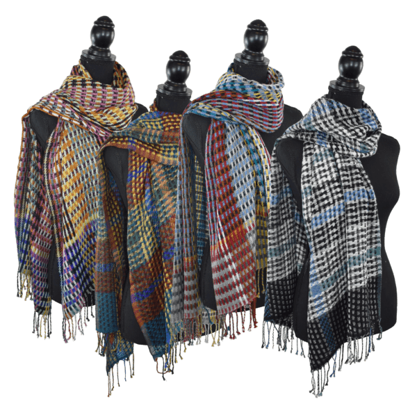 Four patterned woven scarves on display.