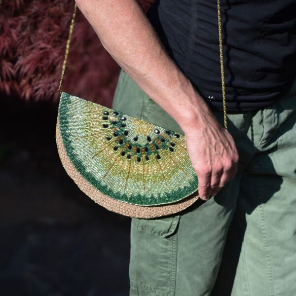 Beaded kiwi-shaped purse handbag.